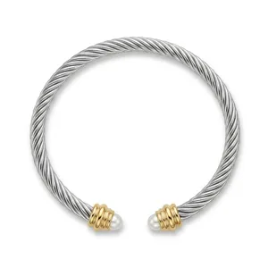 Tweekleurige getwist kabelmanchetarmband met pareluiteinden, verstelbare open armband.