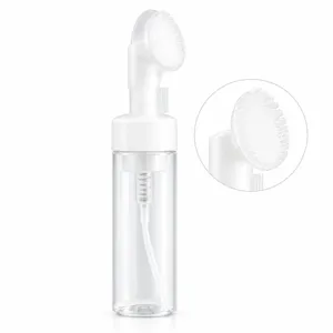 White foam pump bottle with silicone brush head for facial cleansing and foaming