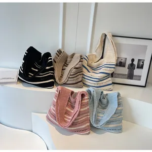 Casual striped knitted tote bag, hollow out shoulder bag, stylish casual beach vacation bag.