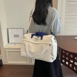 Large capacity travel duffel bag for women, stylish white shoulder crossbody tote bag.