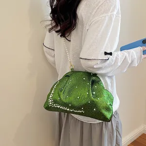 Fashion green metallic pearl shell bag, elegant crossbody evening clutch for women.