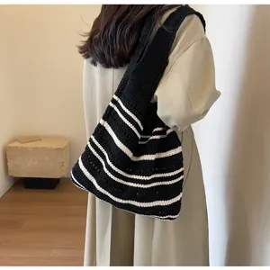 Stylish black and white striped crochet tote bag, large capacity casual shoulder bag for women.