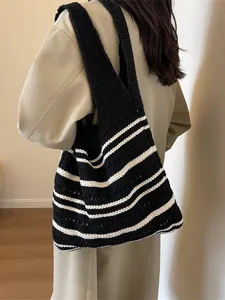 Fashionable black and white striped crochet tote bag, large capacity versatile shoulder bag.