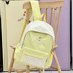Sac à dos d'école à carreaux jaune et blanc brodé mignon japonais pour les étudiants.