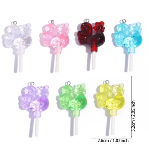 Detail view of colorful rooster lollipop acrylic charms, perfect for DIY jewelry and bag pendants.