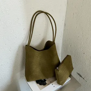 Woven tote bag and matching pouch detail shot, vintage olive green shoulder bag, daily commute design.