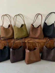 Woven leather tote bag for women, large capacity vintage shoulder bag, casual commuting purse.