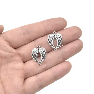 Vintage zilveren engelen vleugel bedels voor DIY sieraden, ketting en armband details.