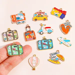 Close up of DIY enamel travel charms, alloy metal pendants for necklaces and keychains.