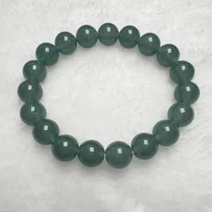 Dark green jadeite style round bead bracelet detailed view, elegant and classic daily jewelry.