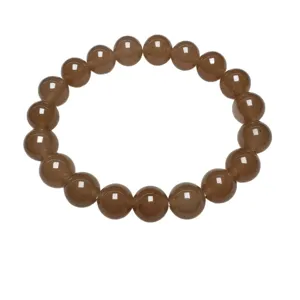 Classic round bead bracelet made of smooth polished quartz stone in a warm brown color.