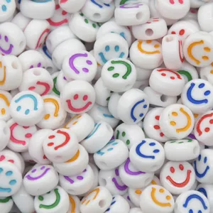 Colorful smiley face acrylic flat loose beads for DIY jewelry and phone strap crafts.