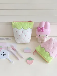 Cute plush strawberry pencil pouch, soft aesthetic stationery organizer for students desk storage.