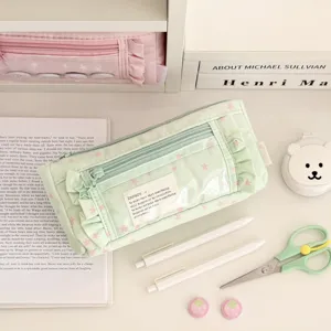 Mint green star pencil case cute student stationery bag with transparent window and ruffles.