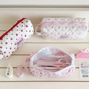 Korean style quilted strawberry pencil case detailed view with cute stationery storage inside.