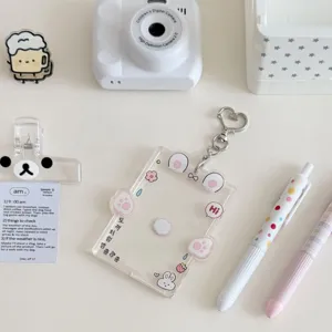 Cute clear acrylic photocard holder with heart keychain for 3-inch polaroid idol kpop cards.