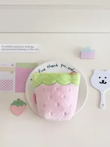 Cute pink strawberry plush pencil case stands firmly on desks, perfect for sweet girl stationery.