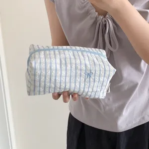 Blue and white plaid pencil pouch cosmetic bag with cute bow embroidery for daily use.