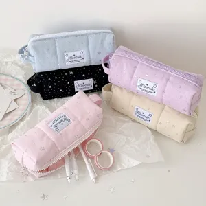 Detail shot of cute star pattern canvas pencil case large capacity stationery storage bag.