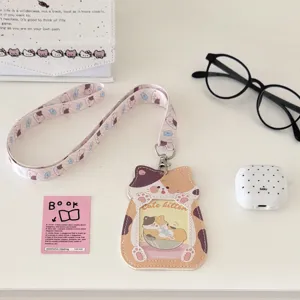 Cute cat PU leather card holder with lanyard, perfect for student ID and transit cards.