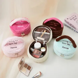 Cute plush cosmetic bag portable travel makeup storage pouch for women and girls daily use.