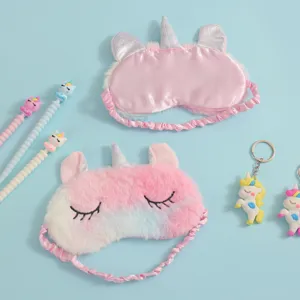 Cute cartoon unicorn plush eye mask set with matching pens and keychains for sweet naps.