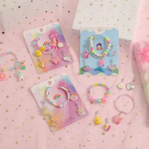 Details of cute kids DIY colorful beaded charm bracelet set with unicorn and shell pendants.