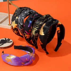 Collection of Halloween wide knotted headbands featuring spider web and bat foil prints