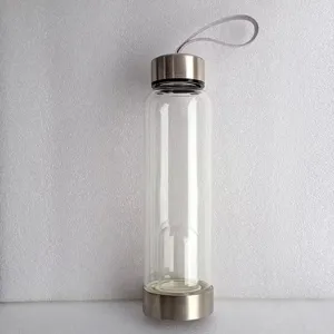 Klare Energie-Glaswasserflasche mit Edelstahldeckel und Fach für Energiesteine