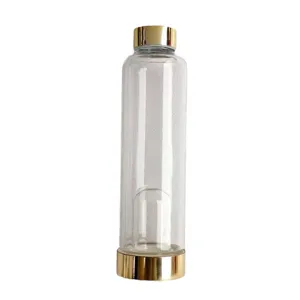 Transparente Glas-Energie-Wasserflasche mit goldener Kappe und Boden für Kristalle