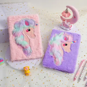 Detailed shot of cute plush unicorn notebook with furry cover and shiny embroidery for girls.