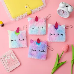 Fluffy unicorn coin purse detail featuring cute plush pouches with secure zipper keychain.