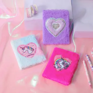 Fluffy plush notebook set with cute sequin unicorn and heart design for daily journaling.