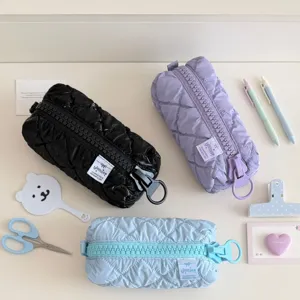 Quilted pencil case with oversized zipper, cute portable makeup pouch and large capacity stationery.