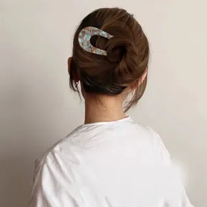Chic U-shaped hair pin for women, elegant acetate hair fork bun maker for stylish daily updos.