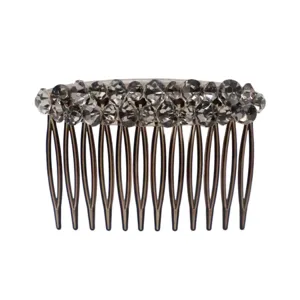 Crystal rhinestone hair comb detail close-up, elegant sparkling hair accessory for women styling.