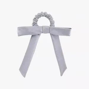 Grey satin ribbon hair scrunchie detail view, elegant long tail bow design for women