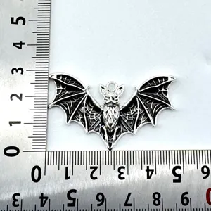 Halloween small bat metal pendant DIY spooky jewelry accessory gothic charm decoration detail view