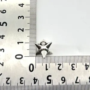 Silver metal spike star pendant DIY jewelry accessory, detailed size measurement view.