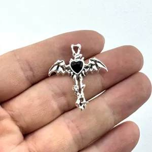 Dark gothic cross pendant featuring a black heart and bat wings for DIY jewelry making.