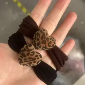 Leopard print heart velvet hair tie detail, soft elastic scrunchie for women and girls daily.