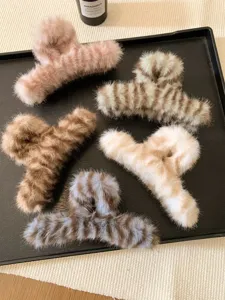 Fluffy plush hair claw clips, large winter leopard print shark clip for thick hair.