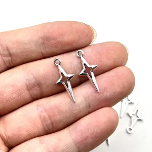 Silver star charms detail view, perfect for DIY earrings, necklaces, and jewelry making.