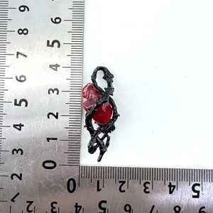 Gothic thorn heart pendant detail, black metal vine wrapping red crystal for DIY jewelry making.