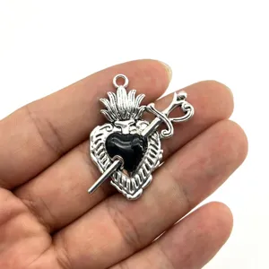 Vintage sacred heart dagger pendant zinc alloy DIY jewelry accessory close up display