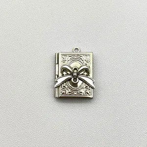 Roestvrijstalen vintage boek strik medaillon hanger, prachtig patroon, DIY sieraden detail.