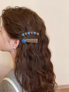 Retro brown and blue drop oil hair clips with cute heart and dot design for sweet daily wear.