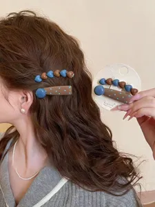 Retro blue heart and brown polka dot hair clip set, perfect side hairpin for sweet styling.
