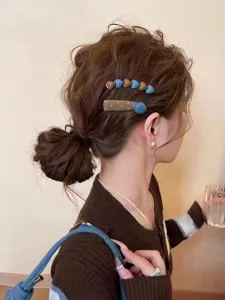 Retro blue and brown polka dot heart hair clips set, cute side bangs hair styling accessories.
