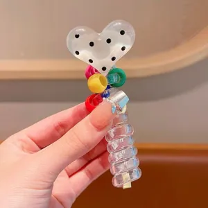Transparent heart polka dot hair tie with colorful beads and spiral phone cord design for daily wear.